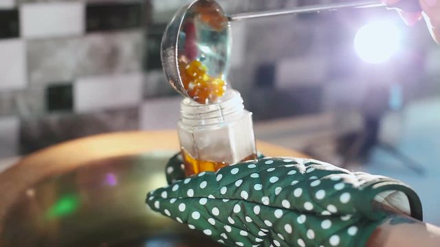 In glass can poured compote from dried fruits