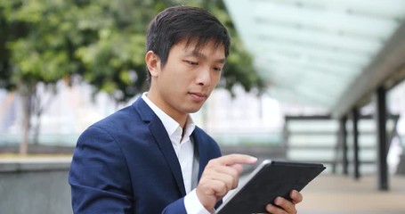 Businessman using tablet computer