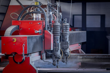 Fototapeta premium Wasserstrahlschneiden - Waterjet Cutting