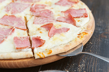 fresh and delicious Italian pizza on a wooden table