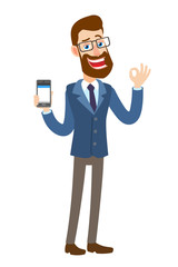 Hipster Businessman holding mobile phone and showing a okay hand sign