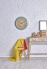 modern living room desk and chair concept with clock