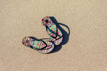 flip flops on the beach
