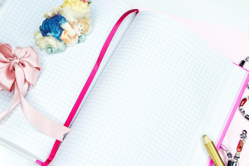 Beautiful notebook with female beauty items