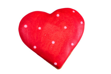 Heart shaped gingerbread cookie for Valentine day isolated on a white background. Top view