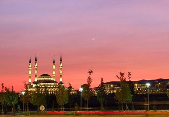 Red sky at sunset taken with a mosque in ankara turkey - obrazy, fototapety, plakaty