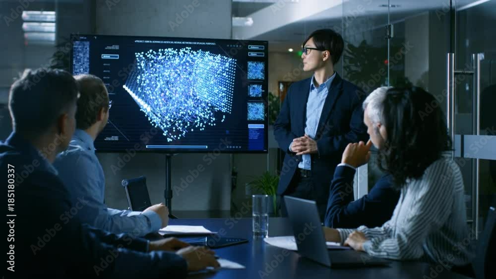 Aufkleber in the conference room chief engineer presents to a board of scientists new revolutionary approach f