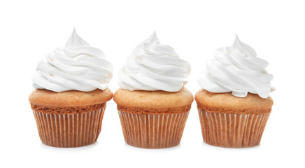 Delicious cupcakes on white background