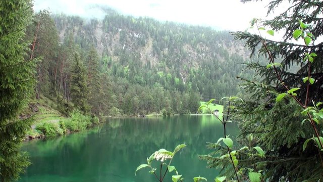 Fernsteinsee emerald green mountain lake at Fernpass in Nassereith Austria. Beautiful alpine attractions of nature.