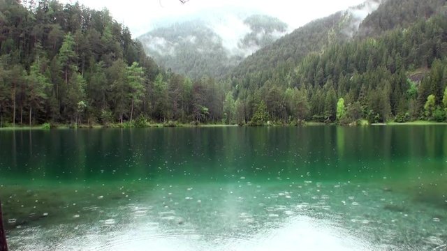 Fernsteinsee emerald green mountain lake at Fernpass in Nassereith Tyrol. Beautiful alpine attractions of nature of Austria.