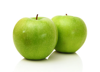 Two green apples isolated on a white background