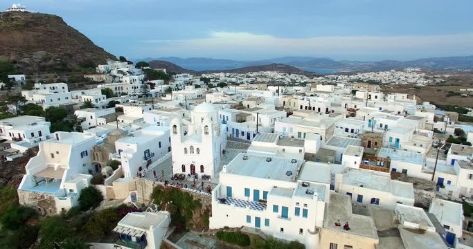 Flight over the town of  Plaka, Milos island Cyclades, Greece