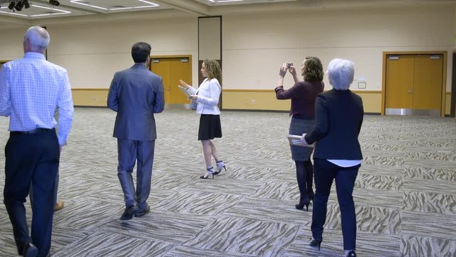 Small group of people checking out a venue for an event