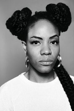 Portrait of a young african American woman with dreadlock.