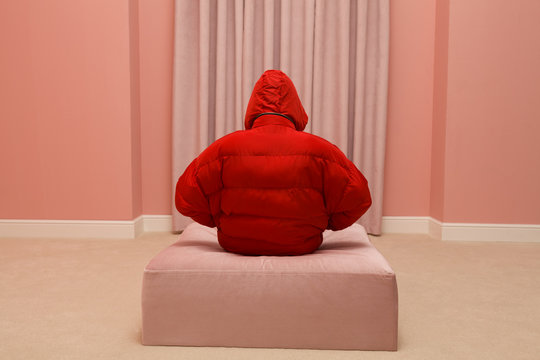 young woman in pink room