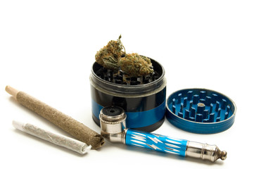 Marijuana Joint, Pipe and Grinder on White Background
