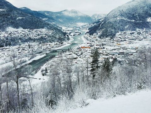 Wintertime - View on Snow-Covered Scandinavian Valley and Town