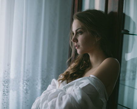 Portrait sexual blonde in a shirt