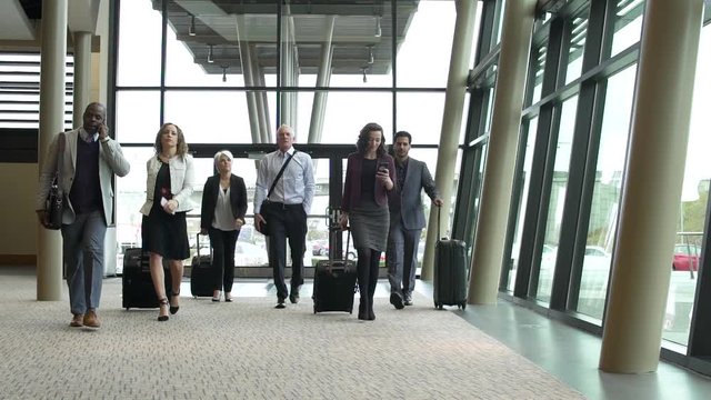 Small group of people entering a convention center