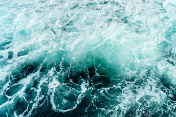 Fototapeta na wymiar Seething atlantic sea water with foam Cape Cod