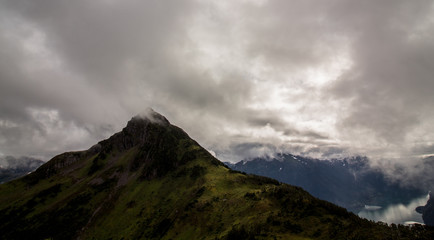 Obraz na płótnie Canvas Mountain in clouds.