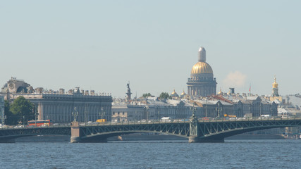 Fototapeta na wymiar Trinity (Troitsky) bridge and the Isaac's Cathedral in the summer - St Petersburg, Russia
