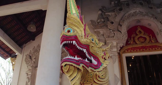 CHIANG MAI, THAILAND, MARCH 2017: Rotating view of Dragon statue outsude Temple