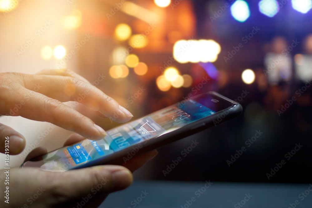 Poster mobile payment, man using mobile payments online shopping with icons on night background, all on scr