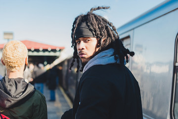 Young man looking back at camera