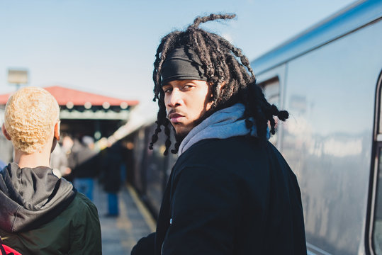 Young man looking back at camera