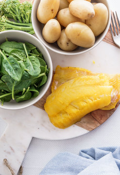 Ingredients for making a healthy smoked haddock dish.