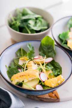 Smoked haddock,spinach and potato salad bowls.