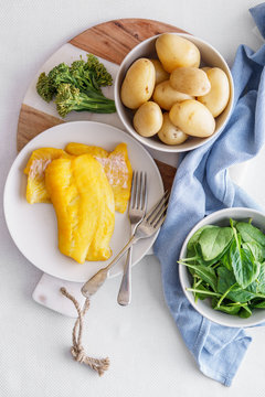 Ingredients for making a healthy smoked haddock dish.