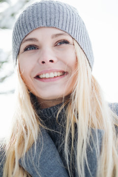 smiling girl on a sunny day in winter