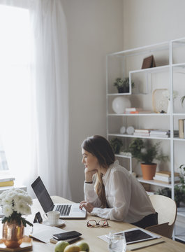 Businesswoman Working at Her Office