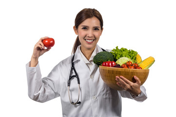 Portrait of beautiful asian young doctor holding the mix fresh vegetables in wooden bowl on white background, include clipping path, Healthy food concept,