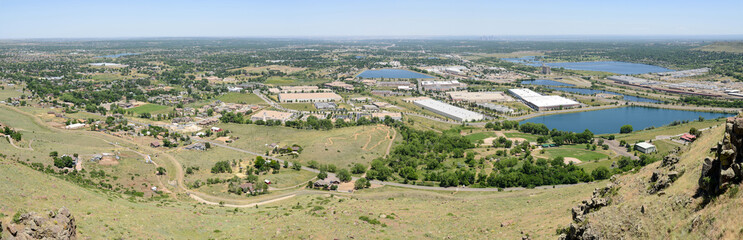 Fototapeta na wymiar Denver West - Panoramic View of a Summer day in Denver (West side, Arvada and Golden area), from the top of north Table Mountain looking east towards Denver Downtown, Colorado, USA.
