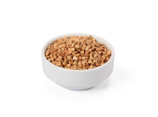 Buckwheat groats in whitebowl isolated on white background