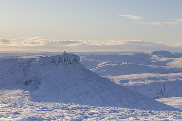 Fototapeta na wymiar Winter snow scene on Pen y Fan mountain in the Brecon Beacons National Park