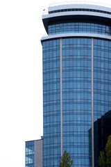 Naklejka premium Office glass buildings on a cloudy sky background