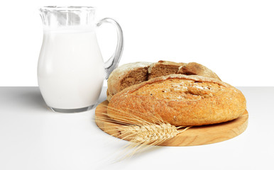 Bread and milk on the table