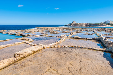 Salt pans near Qbajjar in Gozo, Malta.