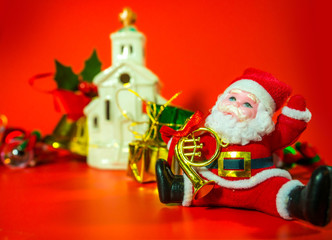 Christmas decoration items with small elements. flat lay decoration on the red background. Attributes of the New Year.