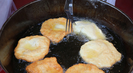 fried pancake called FRITTELLE in italian language made with apples