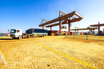Fototapeta na wymiar Industrial container yard of logistics import and export business under the blue sky