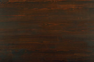 Fototapeta premium photo of natural wood for background or texture, dark brown color