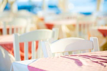 Empty tables of outdoor restaurant
