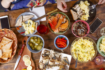 Festive meal. Christmas or Thanksgiving. Happy family at dinner. A Variety of Home-made Dishes