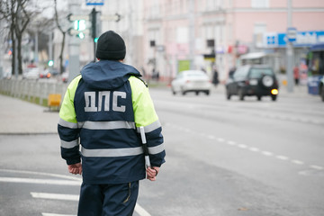 Fototapeta premium GOMEL, BELARUS - December 18, 2017: Officer of the road patrol service with a baton..