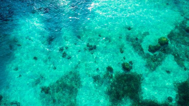 Beautiful clear turquoise seawater at tropical beach in summer